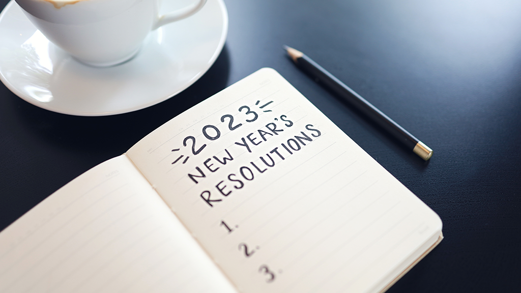 2023 new year's resolutions written in a notebook