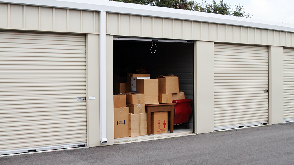 Storage unit with boxes stacked inside