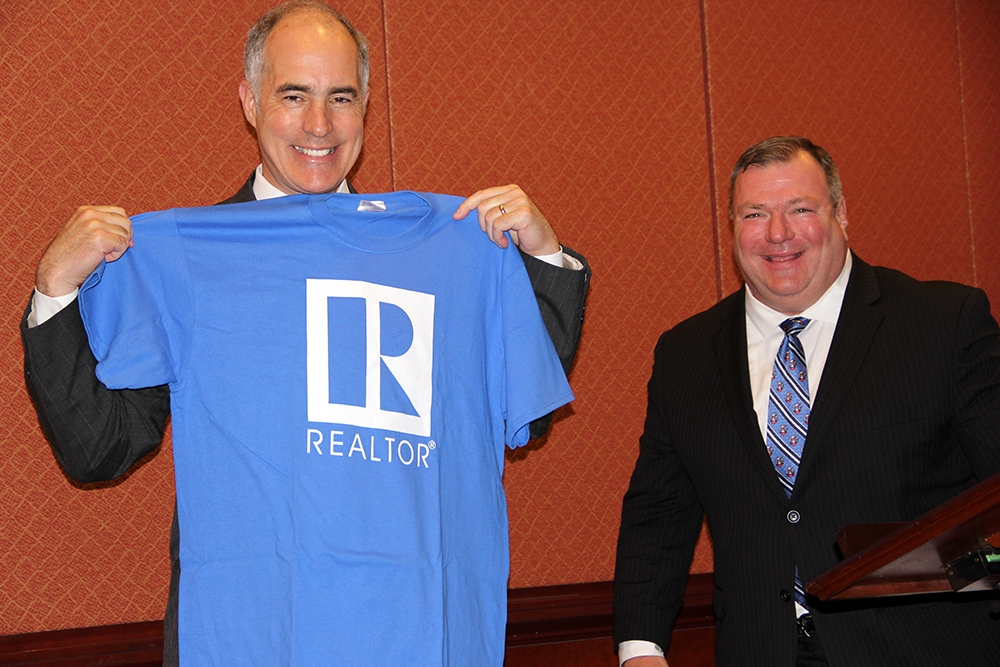 PAR President Todd Polinchock presented Sen. Bob Casey with a Realtor® blue t-shirt.